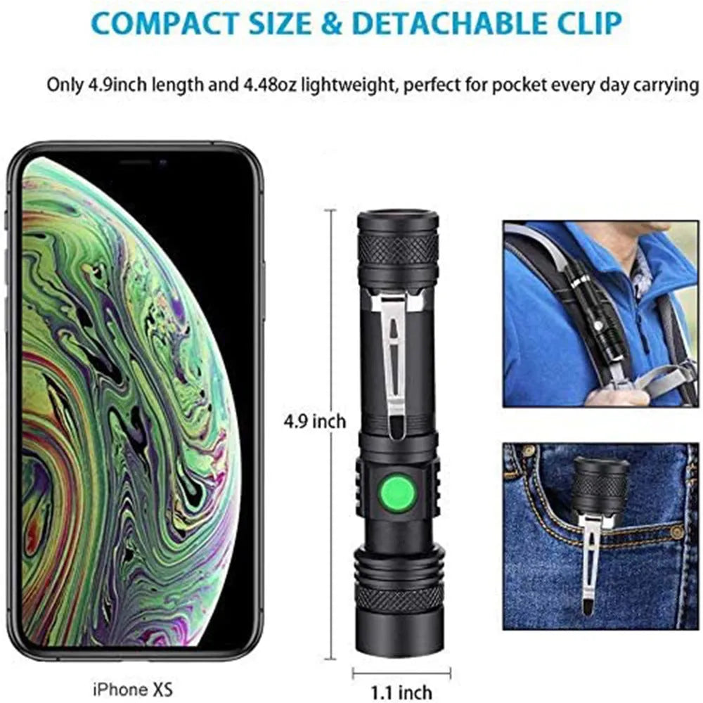 Black telescopic zoom USB rechargeable T6 LED flashlight on outdoor background