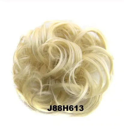 Adjustable hair ring in a natural black shade for creating hair buns and ponytails