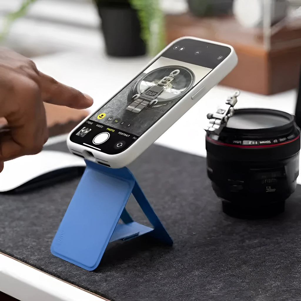 Magnetic mobile phone holder case in Movas leather showing the built-in stand in open and closed positions.