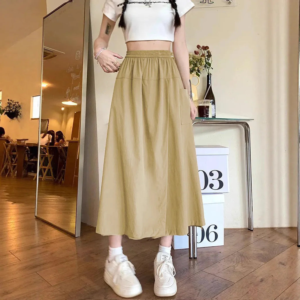 Camel coloured women's cropped wide leg skirt with elastic waist and quilted detailing
