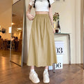 Camel coloured women's cropped wide leg skirt with elastic waist and quilted detailing