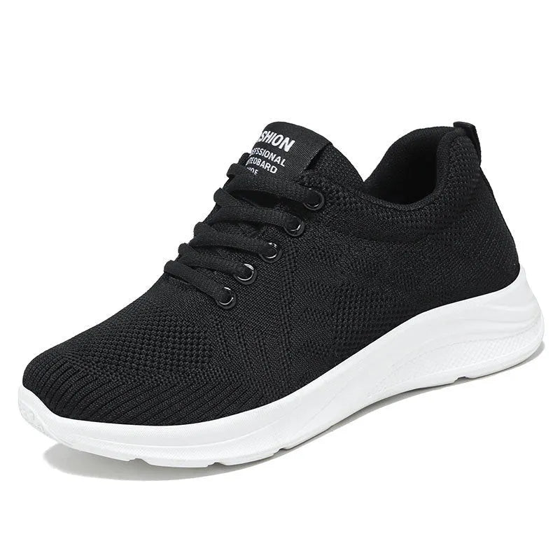 Spring Sole women's casual sports shoes in grey with mesh upper and white PVC sole on a light background