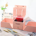 Blue cardboard jewellery gift box with removable lid for storing a plastic eternal rose and accessories.