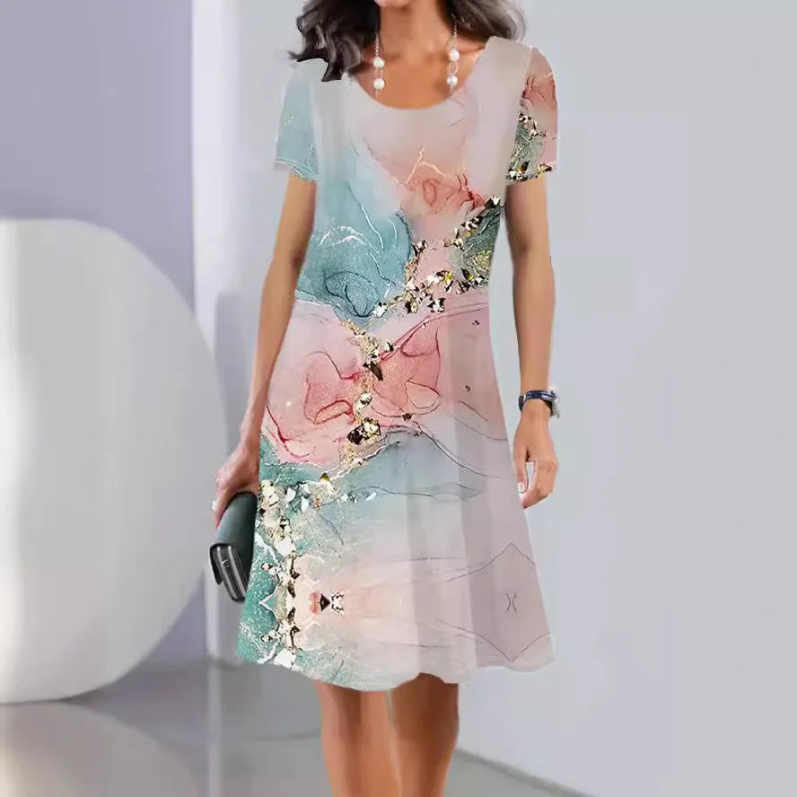 Women's floral print midi dress with short sleeves and a round neckline, shown in an A-line silhouette.