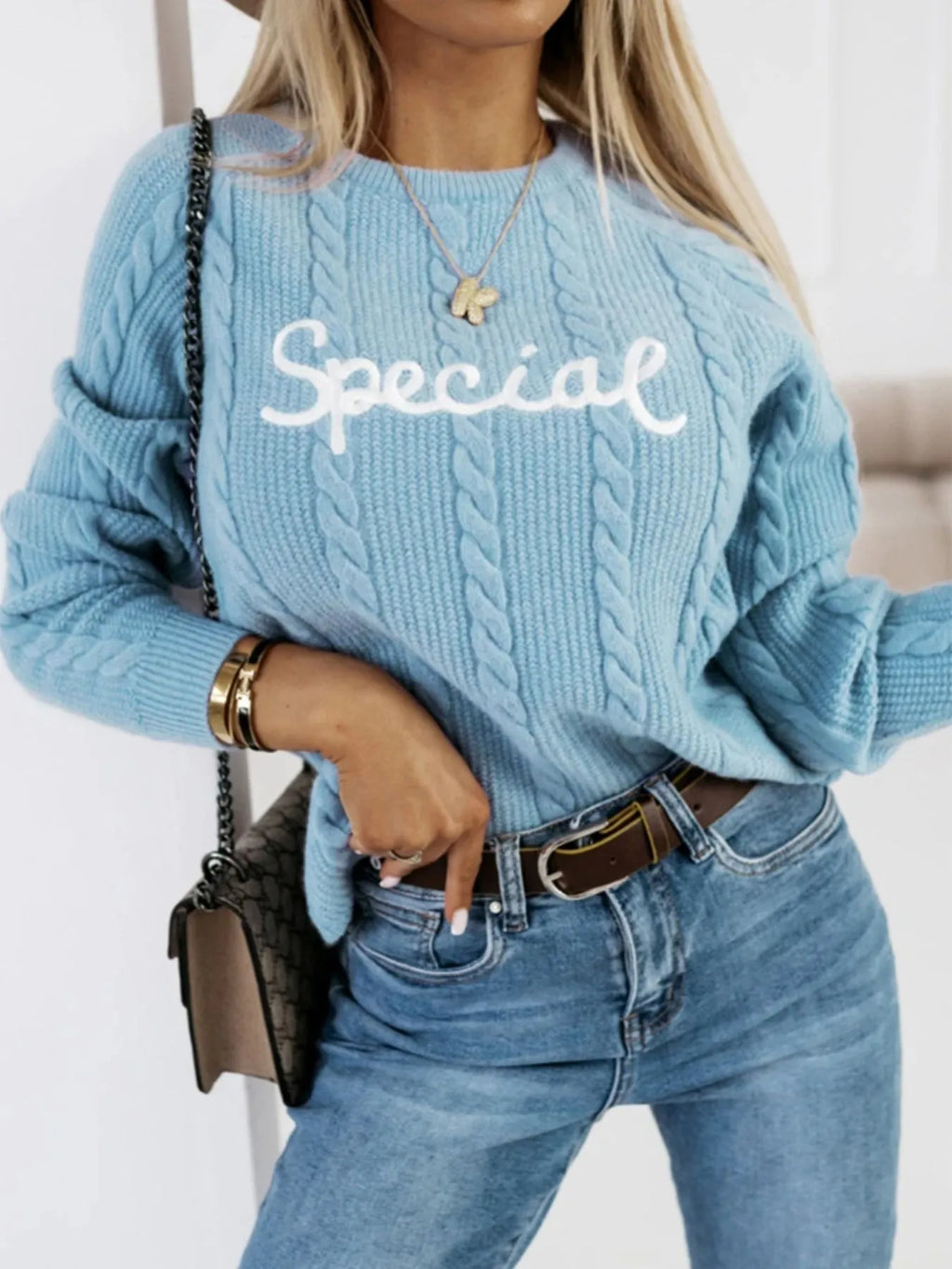 Blue men's pullover with embroidered letter design on crew neck knit sweater
