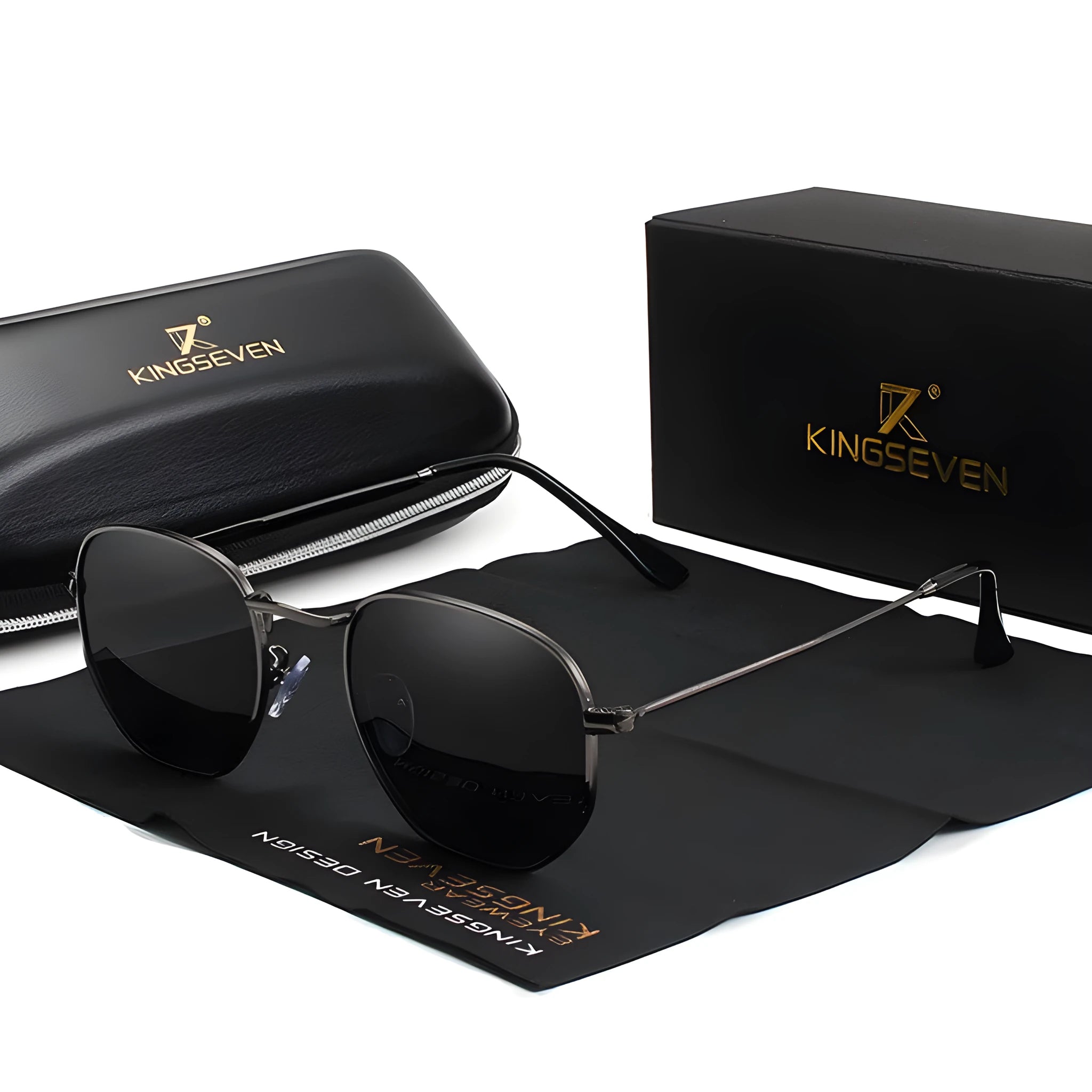 Classic round polarised sunglasses for men in gun metal grey with adjustable nose pads on a wooden table.