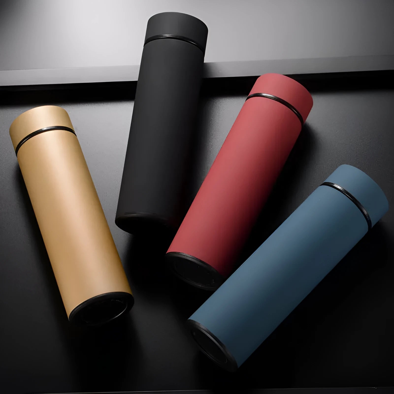 450ml stainless steel water bottle with double wall vacuum insulation in black, red, gold, or blue colours