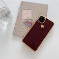 Luxury plating love solid colour TPU back cover case for iPhone on a table.
