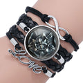 Glass cabochon wrap bracelet with House Stark wolf head and Winter Coming text on metal bangle