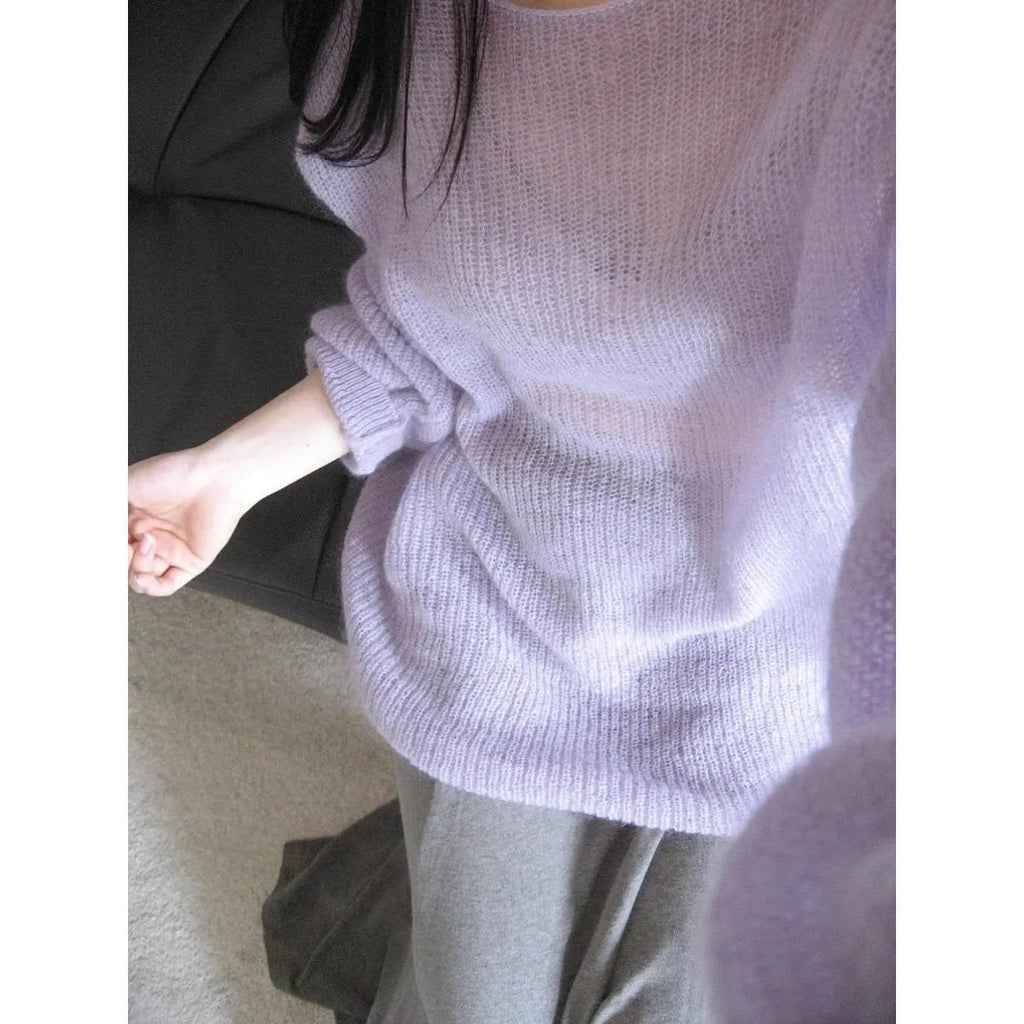 Purple women's Ice Silk blouse with hollow-out princess sleeves on a hanger.