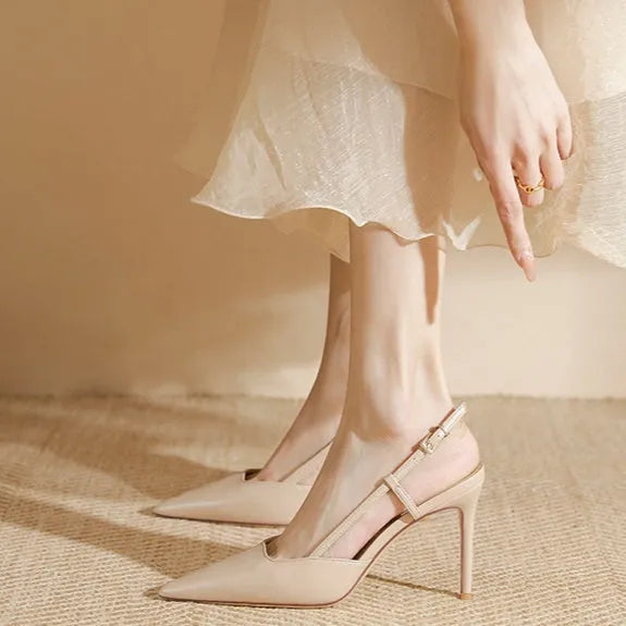 Apricot women's high-heeled sandals with a buckle toe strap, shown with a rubber sole.