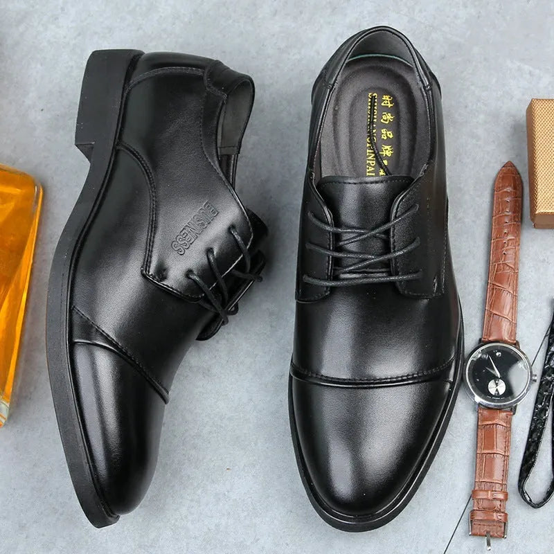 Men's black formal leather lace-up shoes with stitching detail and rubber sole