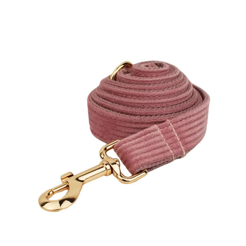 Corduroy dog collar and matching accessories including leash, vest, bow tie, and poop bag holder
