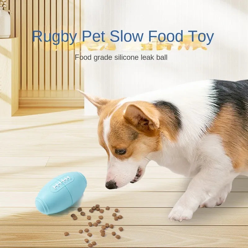 Blue silicone rugby ball dog toy with hollow centre for treat dispensing