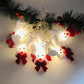 Christmas snowman LED string lights garland with warm white bulbs and character decorations