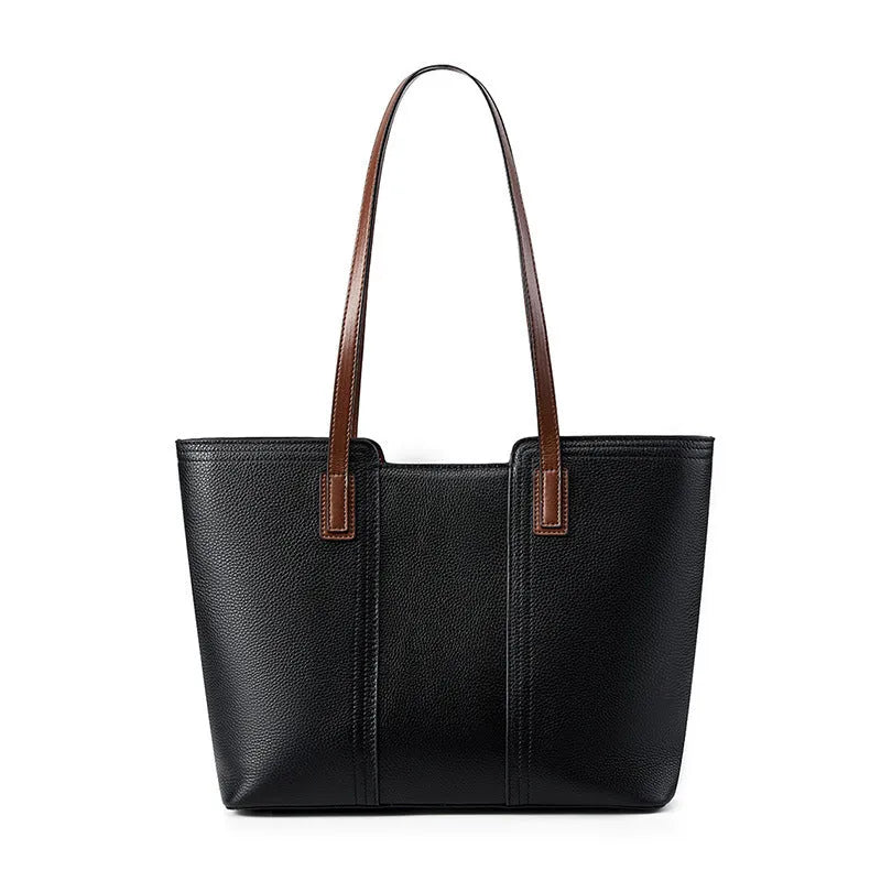 Women's black cowhide leather crossbody bag showing multiple internal compartments including phone pocket and file storage