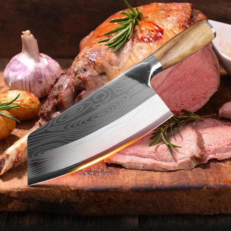 Stainless steel kitchen knife with a 320mm forged blade on a cutting board.