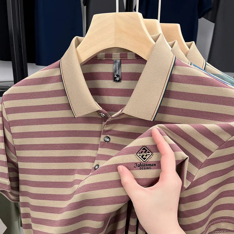 Man wearing a red and white mosaic striped short sleeve t-shirt with Asian sizing.