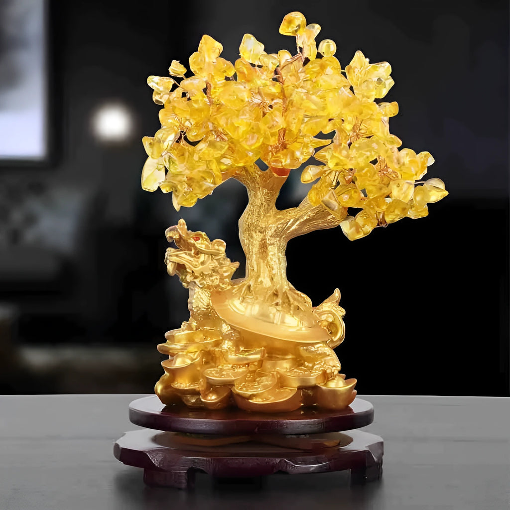 Citrine resin turtle money tree Feng Shui ornament on a white background.