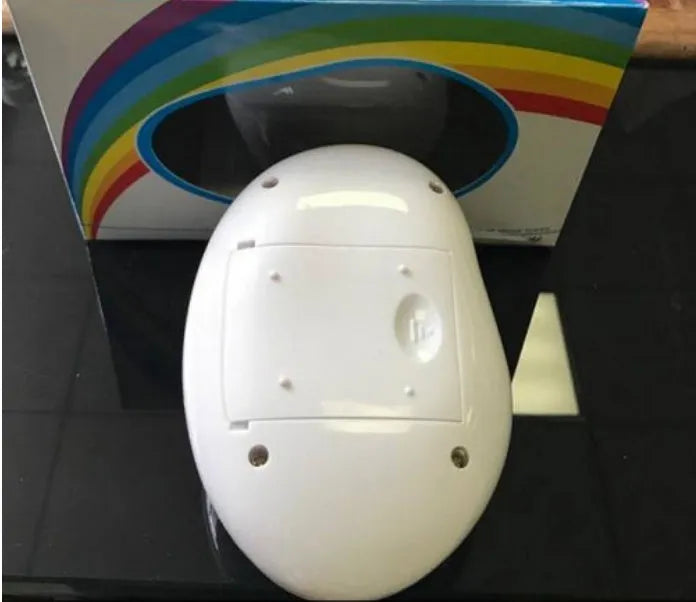 White ABS LED rainbow projection night light with multicolour beam on ceiling