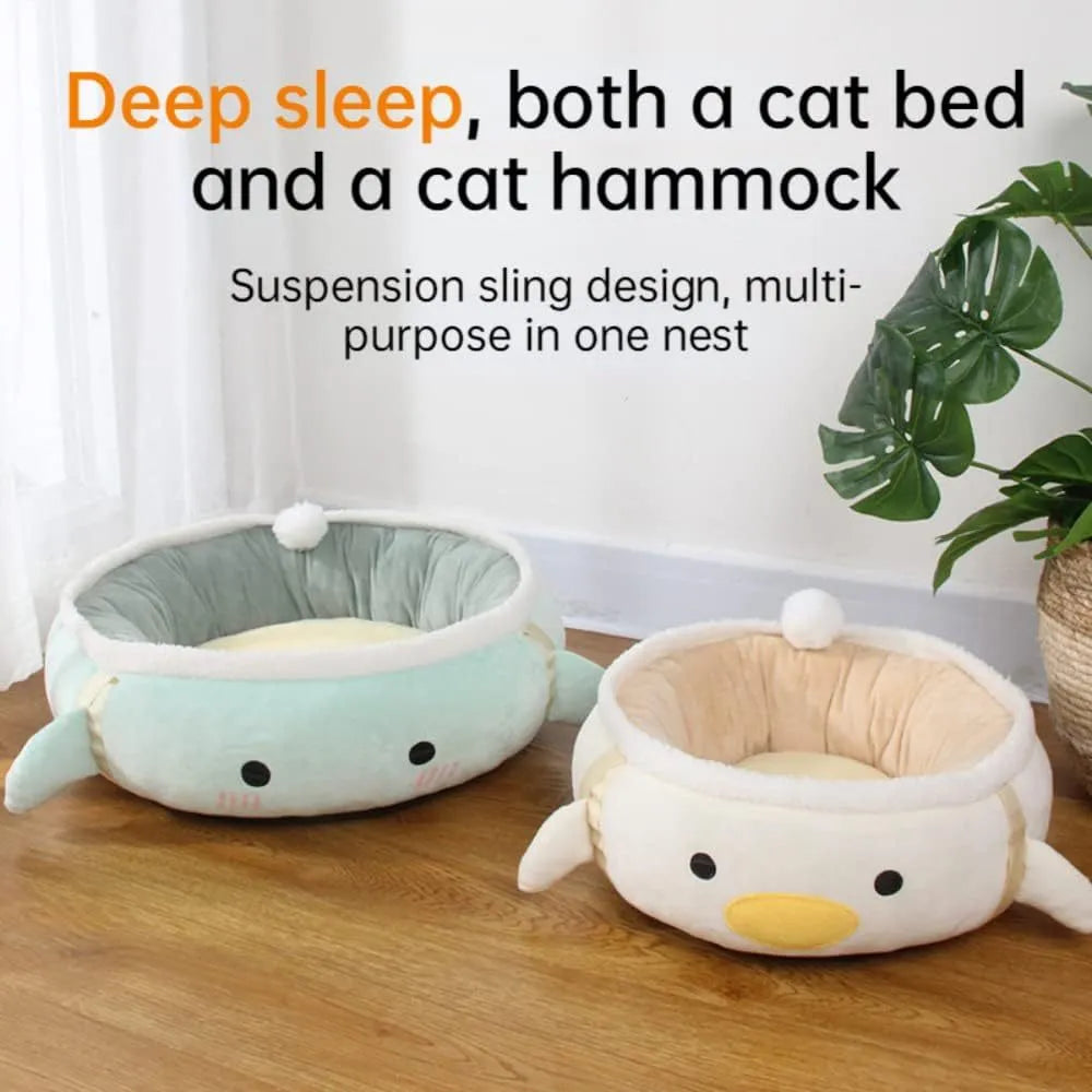 Green chick-shaped cat bed that can be used flat or hung as a hammock for a small cat.