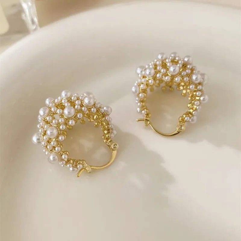 Gold-coloured copper flower basket earrings with small rice-shaped bead inlay for women