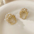 Gold-coloured copper flower basket earrings with small rice-shaped bead inlay for women
