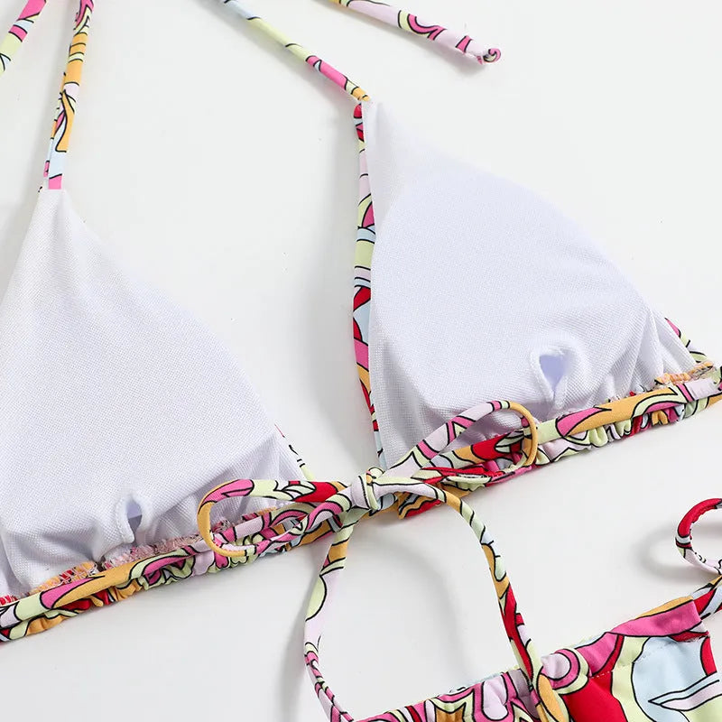 Women's triangle print bikini set with halter neck top and separate bottoms in multicolour pattern
