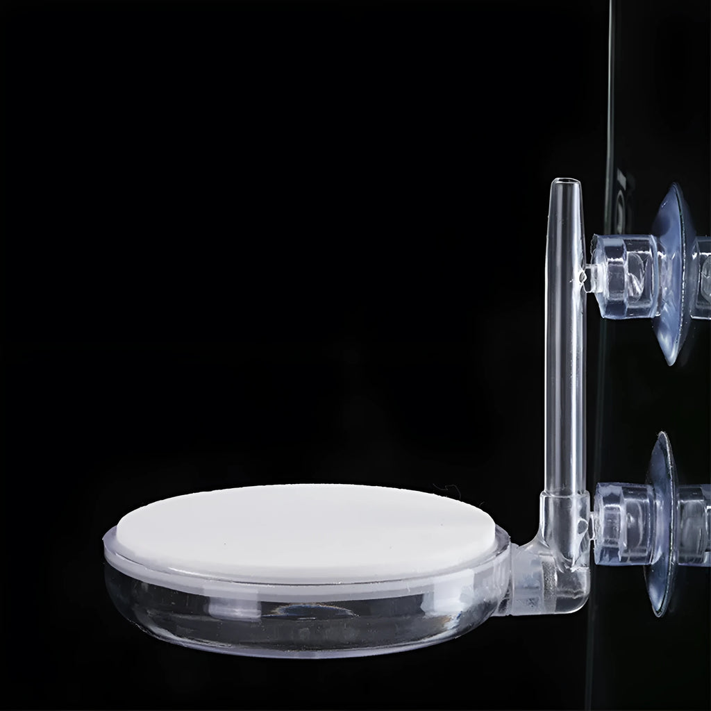 White transparent PC aquarium air refiner with nano bubbles and suction cups, shown on glass tank