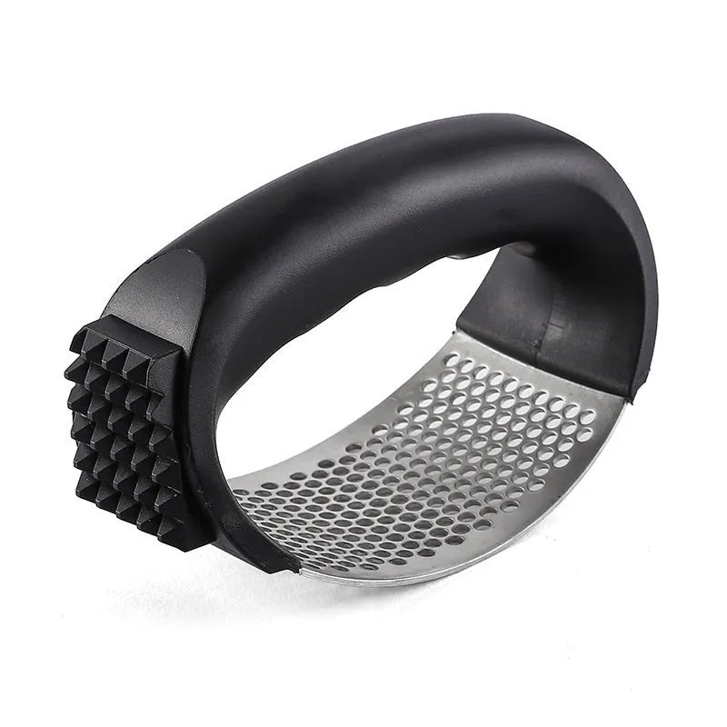 304 stainless steel garlic press in green, pink, black or blue measuring 11cm by 7cm
