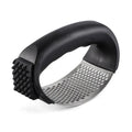 304 stainless steel garlic press in green, pink, black or blue measuring 11cm by 7cm