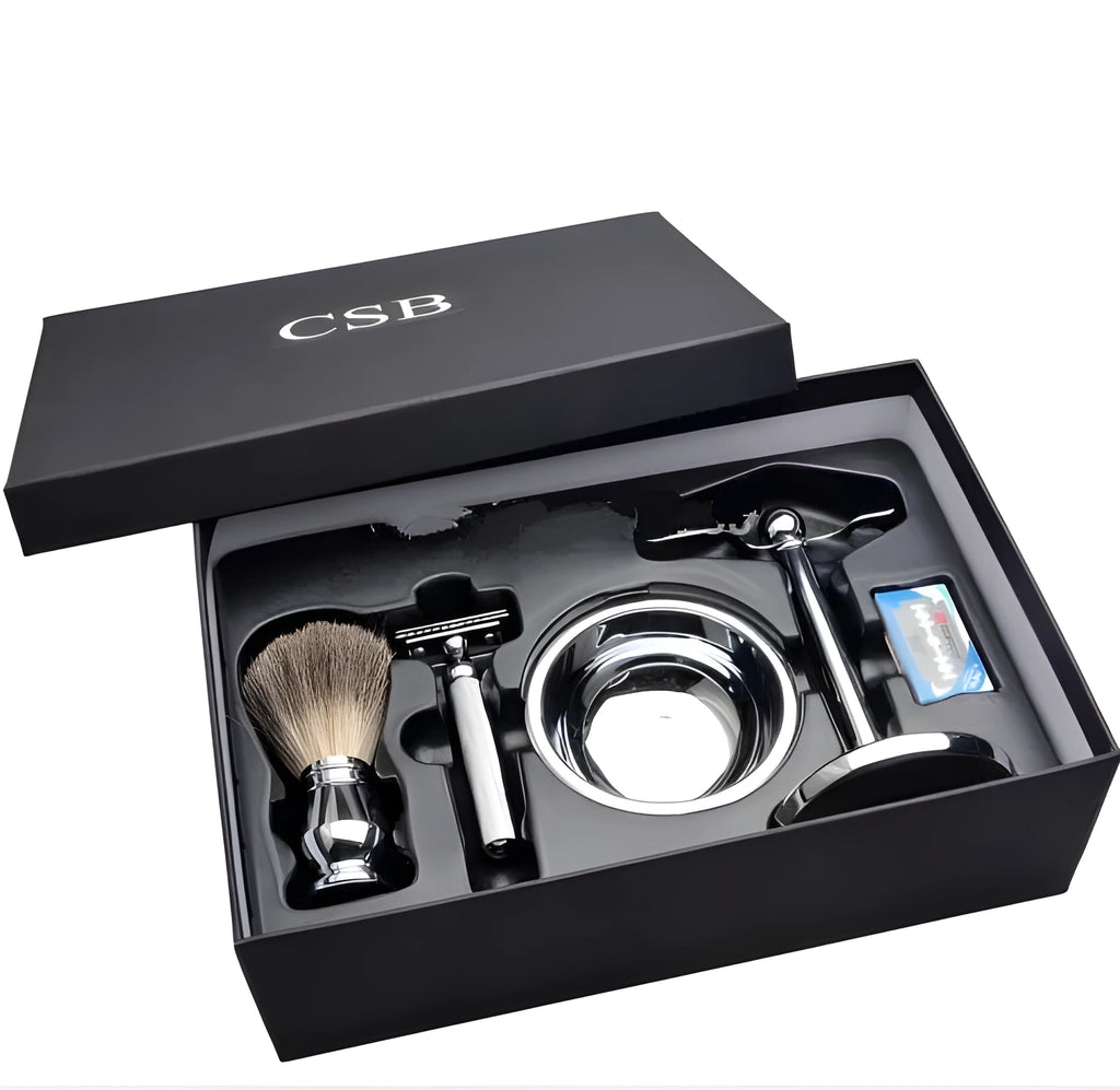 CSB shaving set with chrome safety razor, badger hair brush on stand, zinc soap bowl, blades and black box.