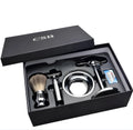 CSB shaving set with chrome safety razor, badger hair brush on stand, zinc soap bowl, blades and black box.
