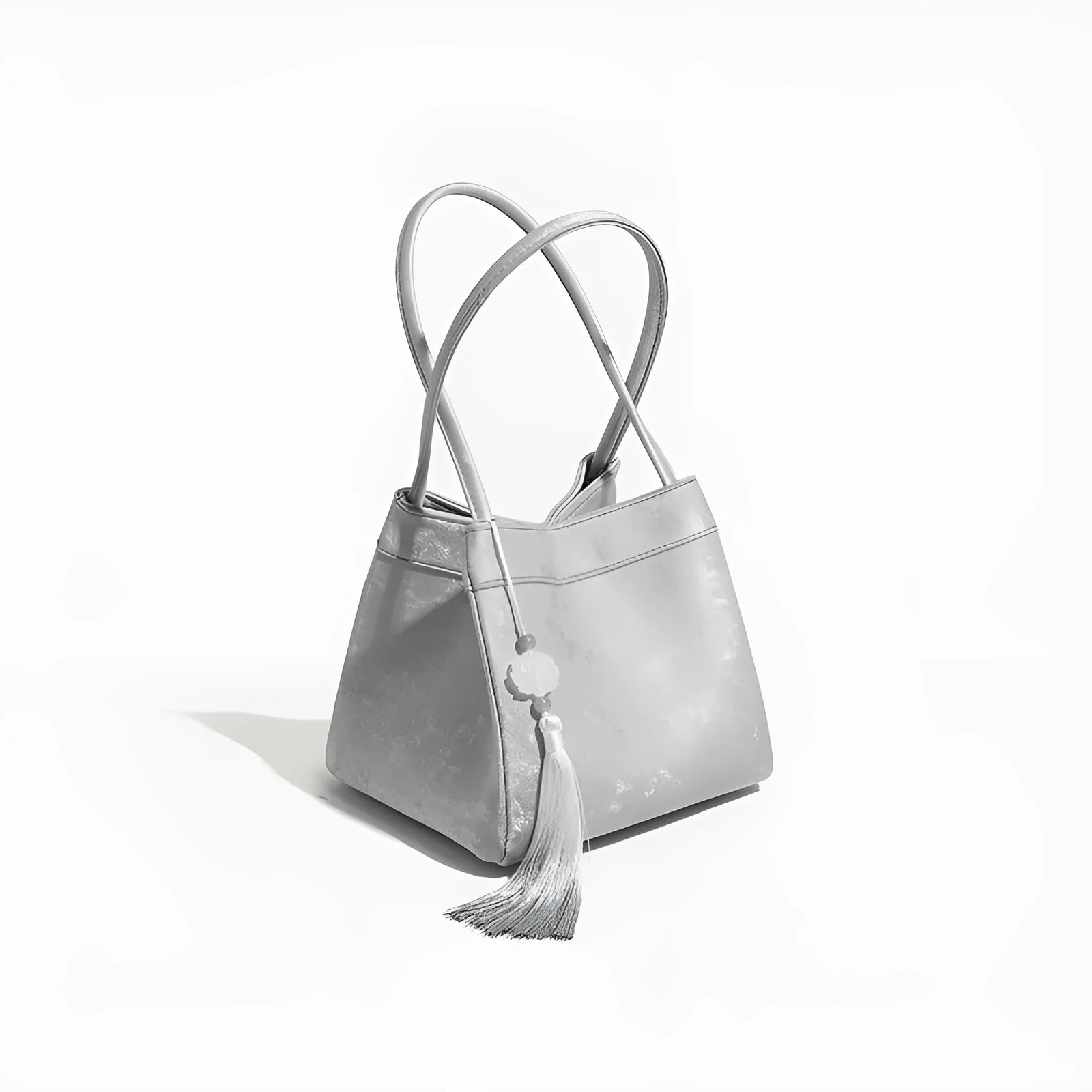 Portable shoulder crossbody bag in black PU leather with open pocket outer and sewing thread detail