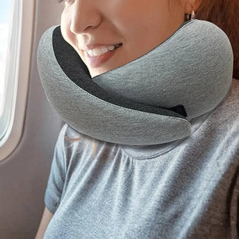 U-shaped travel neck pillow with memory foam filling in navy blue colour with buckle fastening