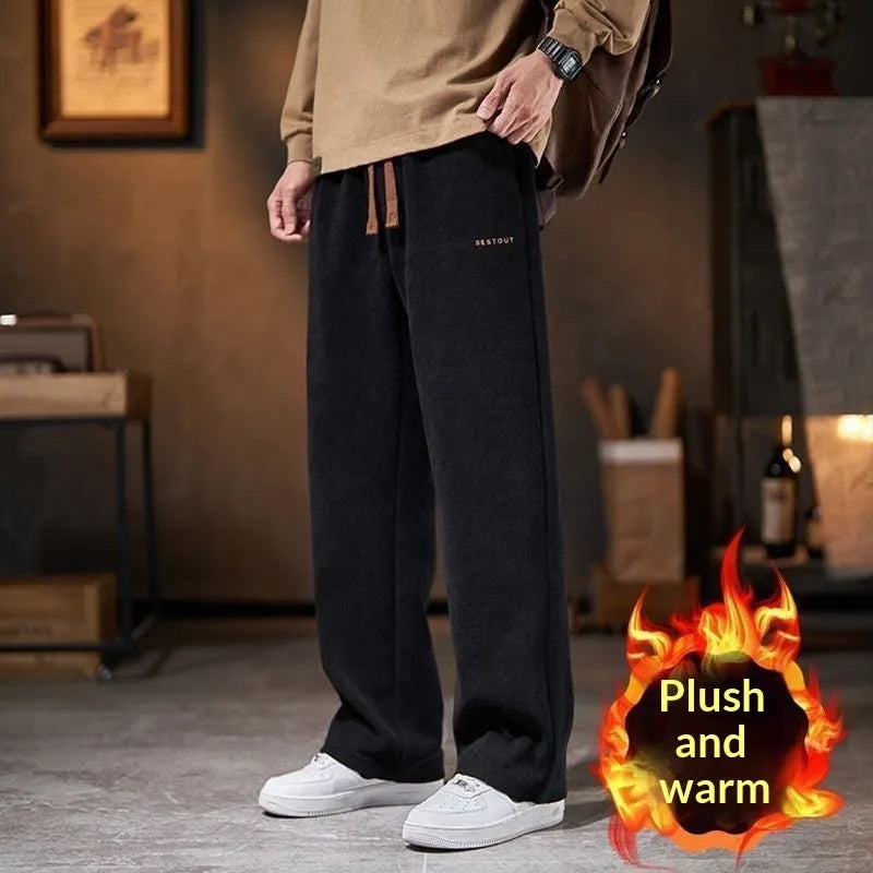 Men's loose straight-leg fleece-lined trousers in dark gray, polyester fabric, mid-rise waist, side view