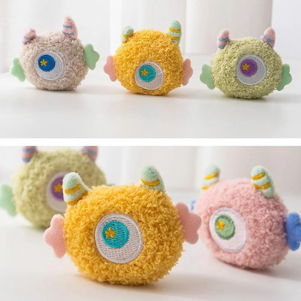 Cartoon plush dog chew toy with big eyes and squeaky sound feature.