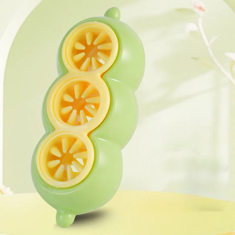 Green dog puzzle toy with food leak openings and bite-resistant material on a white background