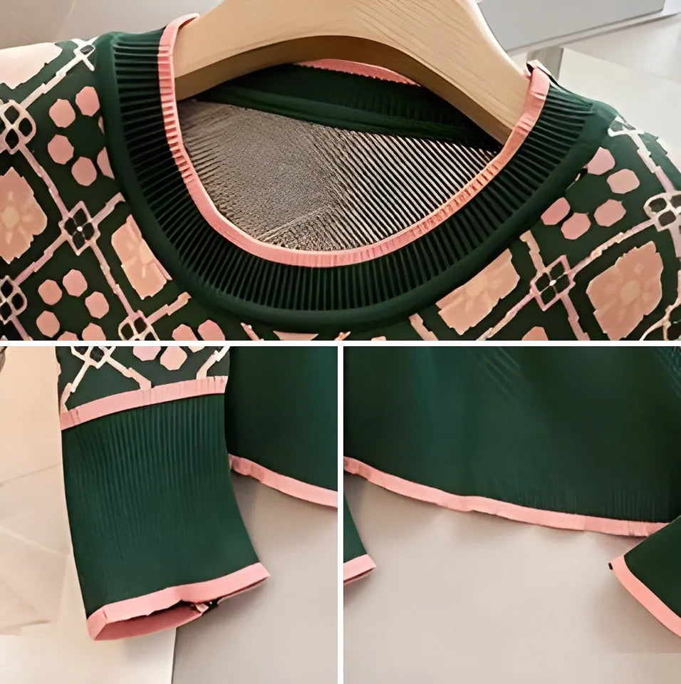 Green printed loose-fit sweater for women, shown on a hanger.