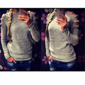 Grey women's long-sleeved knit shirt with round neck and hollow-out crochet pattern detail.