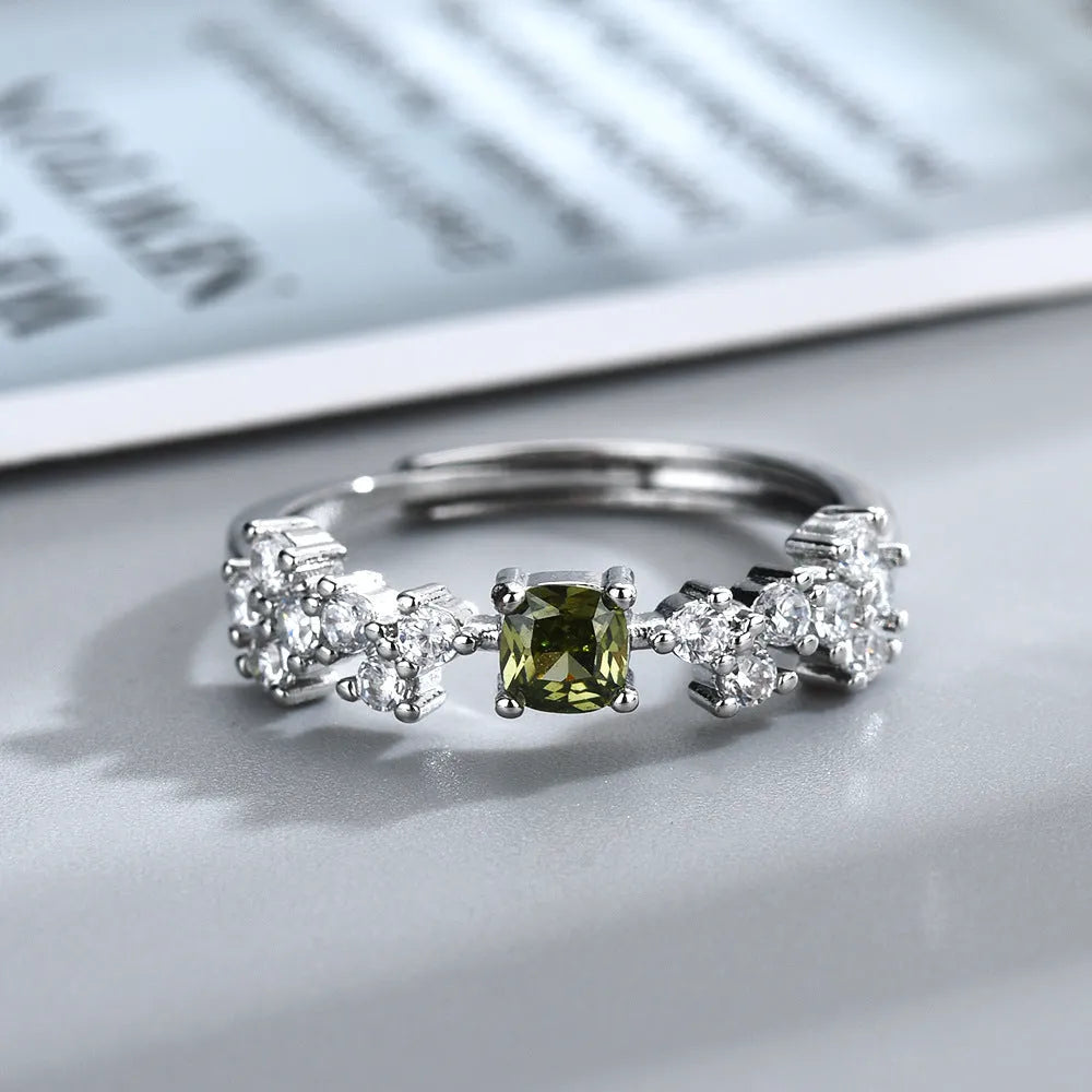 Adjustable copper crown ring with square olive green zircon stone and white gold tone electroplated finish