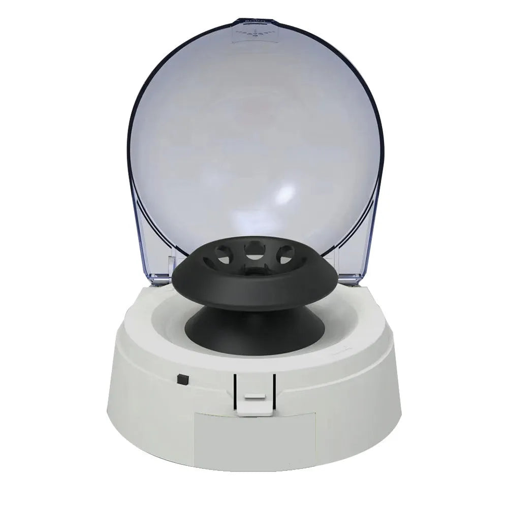 Small white mini laboratory centrifuge with digital display on a benchtop.