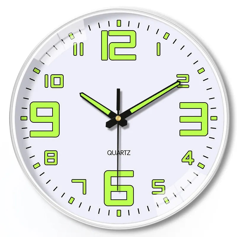Modern 8-inch luminous wall clock with white face and black numbers on a wall.