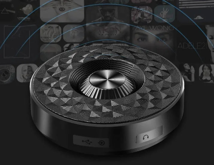 Compact portable Bluetooth speaker in black, orange, or silvery white with wireless audio and FM radio.