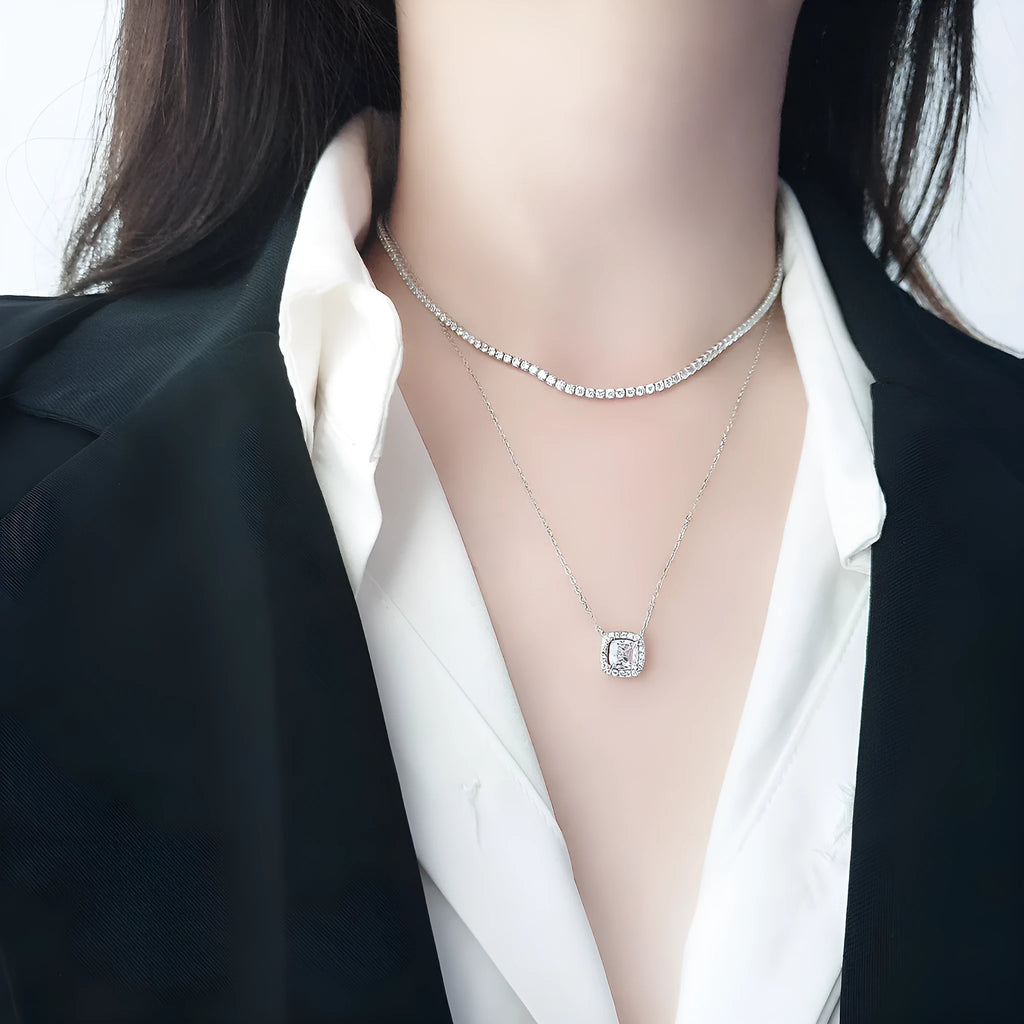 Women's sterling silver necklace with round design and diamond treatment on 925 silver chain