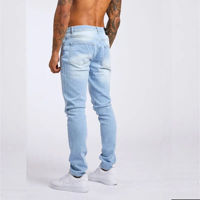 Men's fashion casual slim fit high waist jeans in light blue cotton with solid colour finish
