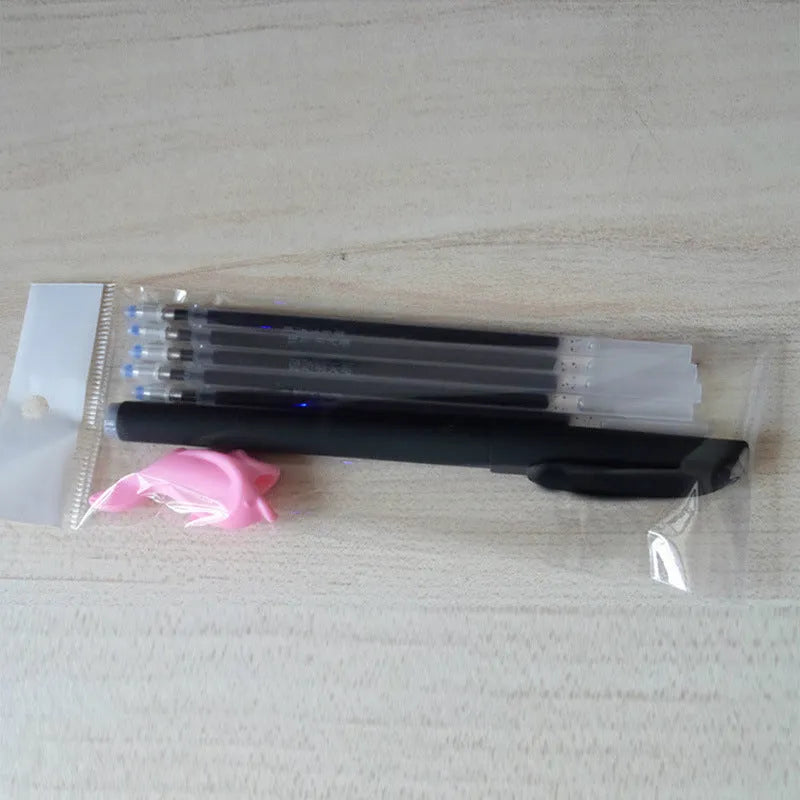 Automatic fade away pen set with holder, case and eight refills for temporary writing