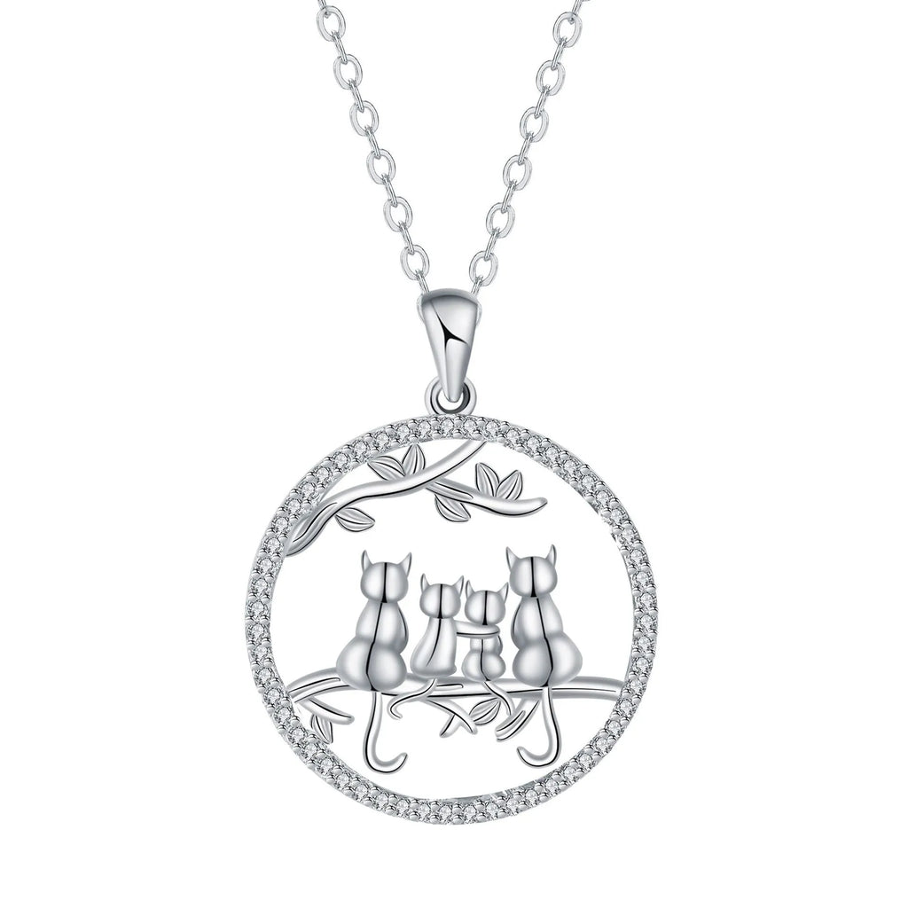 Women's copper necklace with four kitten pendants on cross chain design