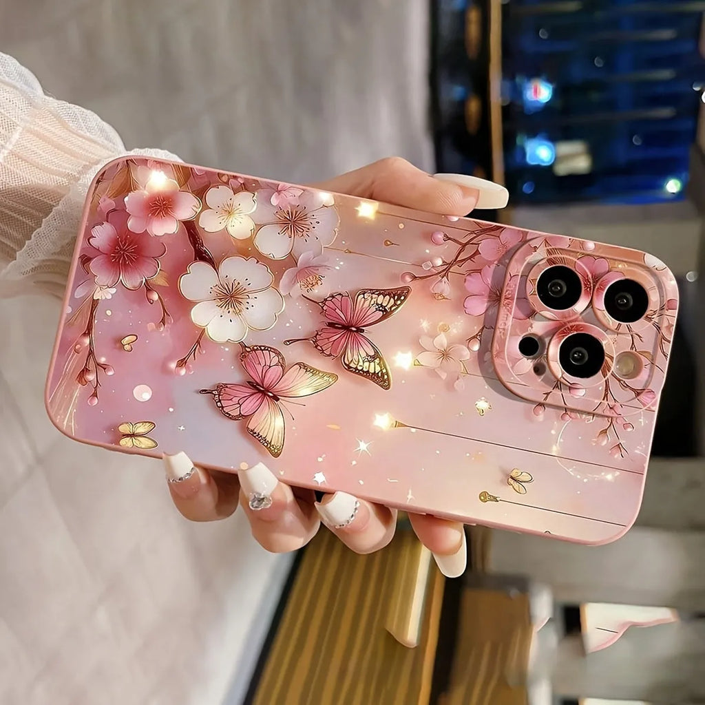 TPU soft shell phone case with butterfly design in pink for iPhone 15 Pro Max, showing protective edges and sprayed finish