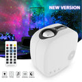 Black cube laser star projector showing nebula and moon display on a wall.